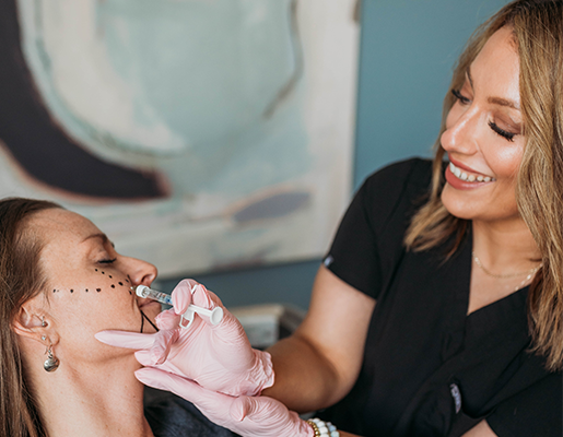 Carmen Puckett, RN CANS Injecting a patient