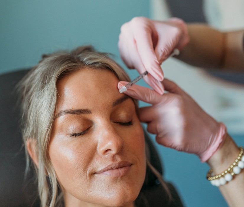 Botox injection placed in the glabella during a treatment at Yoo Direct Health in Noblesville, Indiana
