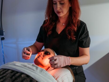 Megan Martin performing an LED light therapy facial at Yoo Direct Health in Noblesville