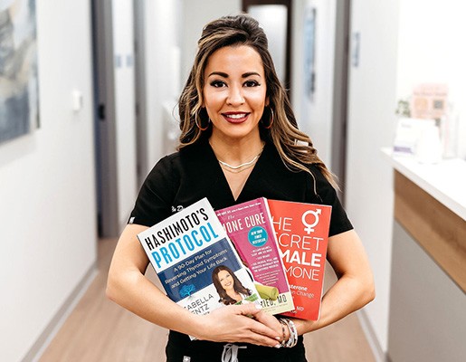 Lexi Yoo, NP holding autoimmune and inflammation disorder resources and books